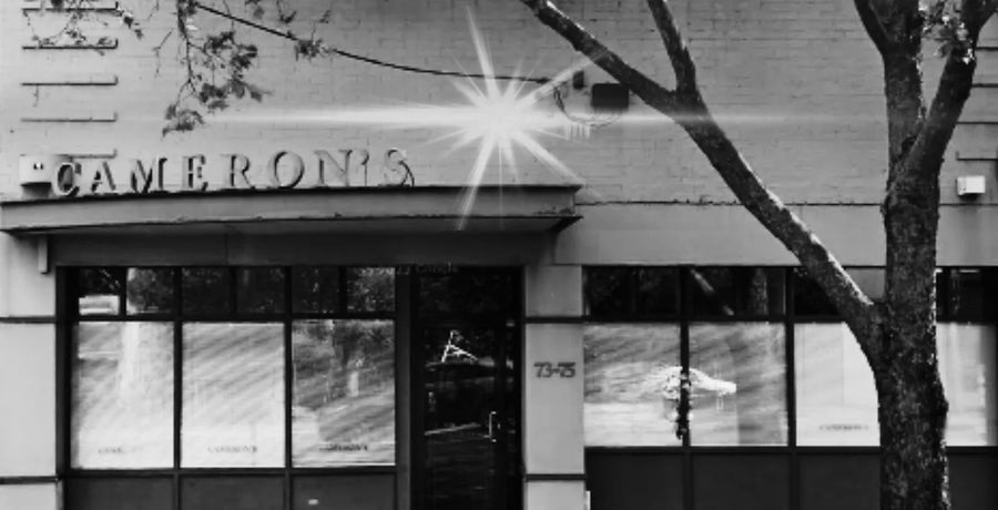 Cameron and Co showroom exterior in black and white