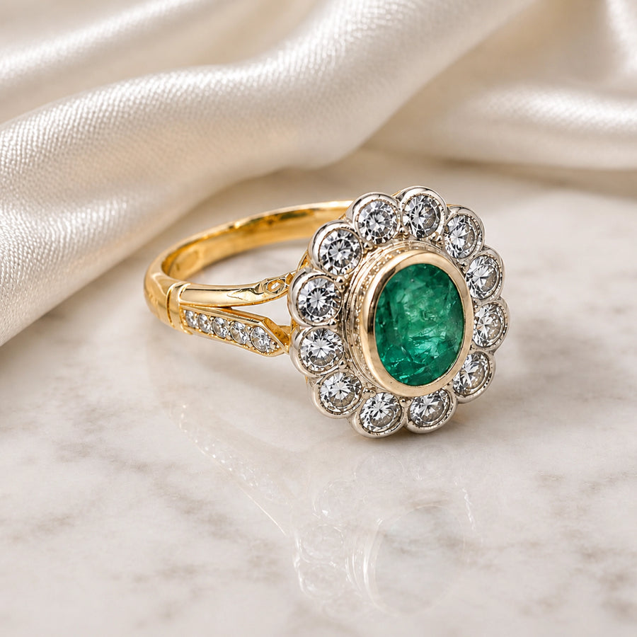 Emerald flower halo ring, an example of a remodelled vintage-inspired design