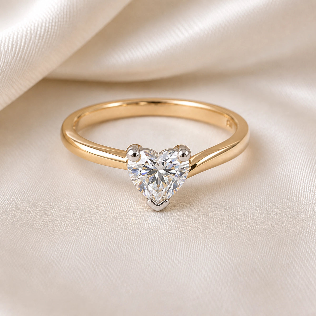 Heart-cut diamond solitaire ring in yellow gold