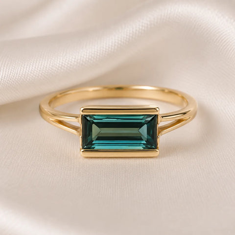 Diamond halo stud earrings on satin photographed for a client story