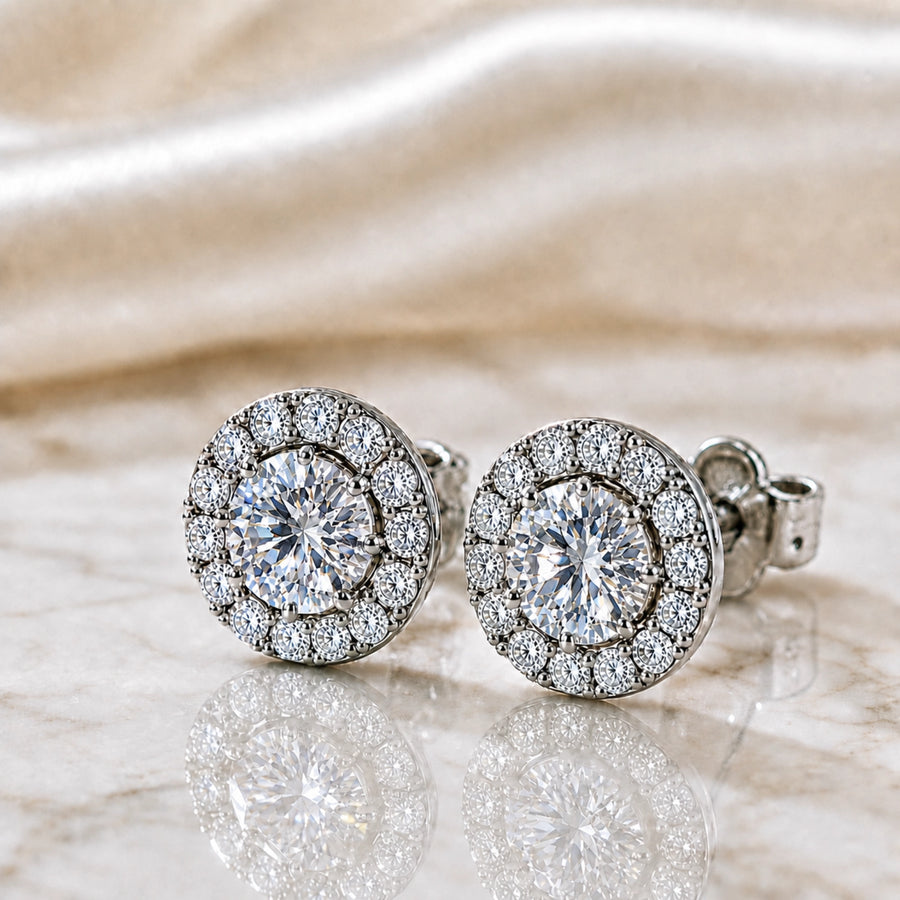 Diamond halo stud earrings prepared for valuation documentation